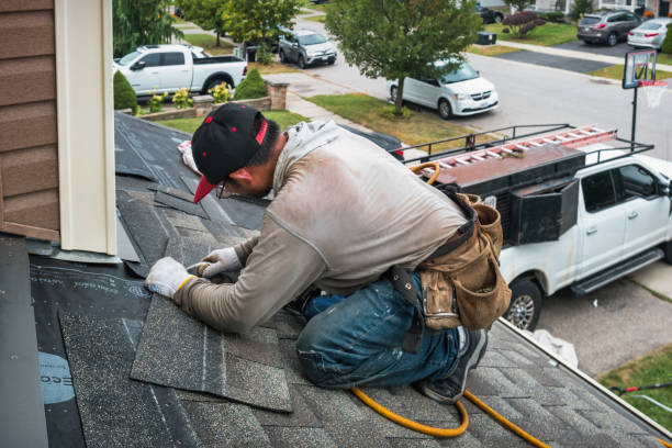 Professional Roofing technician working in Riverton, IL